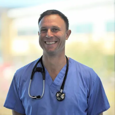 Dr. Mark Tonzing